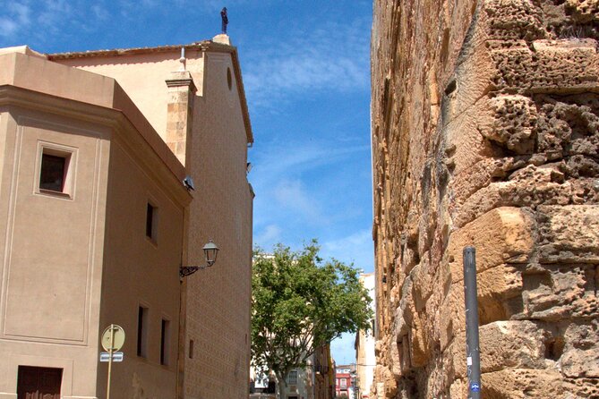 Tarragona Walking Tour: An Audio Guide to Tarraco - Medieval defenses, the city gate, and Roman civic life
