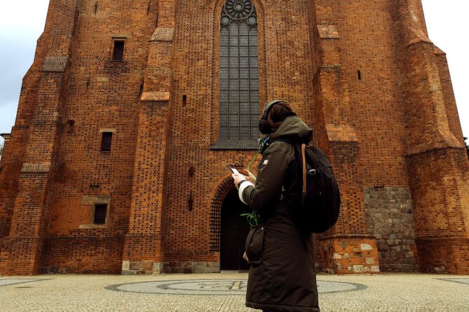 The Birthplace of Poland: A Self-Guided Audio Tour of Poznań - Genius Loci and the city walls beneath your feet