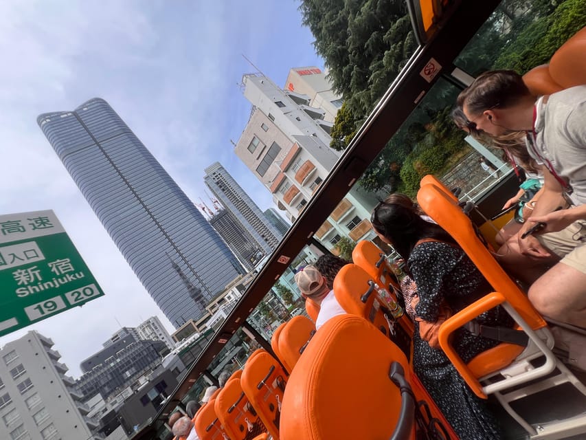 Tokyo: 60min Panoramic Open Top Bus Tour with Audio Guide - Tokyo Tower from a moving upper deck