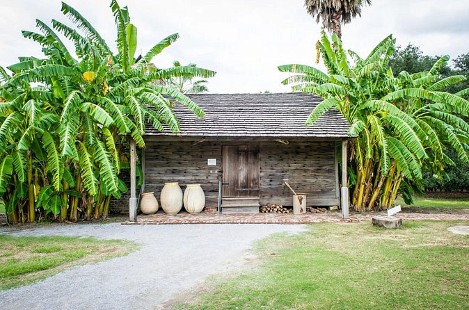 Whitney Plantation Tour with Transportation - Slave cabins, tools, and daily life