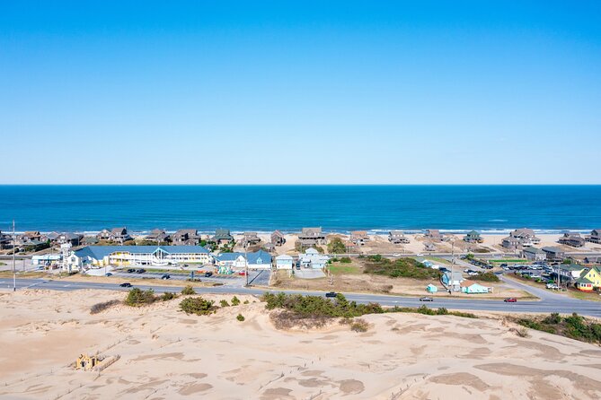Wright Brothers Carolina Dunes Self-Guided Driving Audio Tour - Avalon Pier adds an easy ocean break